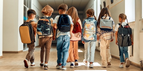 Image Text: children going back to school and needing a back to school dental routine